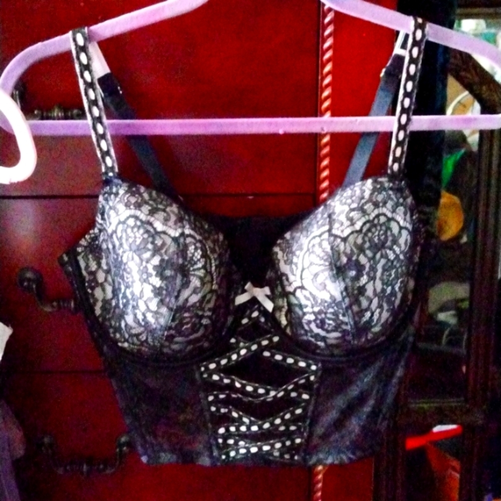Victoria's secret bra/corset in black and accented with pink. Size XL